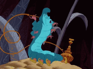 animated image of the blue caterpillar from the Disney Alice in Wonderland blowing smoke words "Who Are You?"